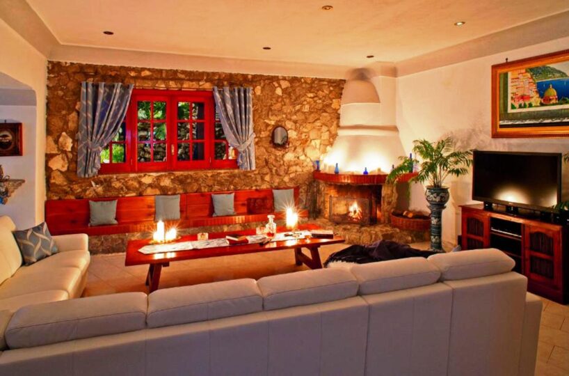 Positano villa with private swimming pool and 6 bedrooms for rent living room in dark